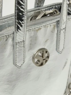 Borsa Sparkling Secret Pon-Pon in vernice laminata