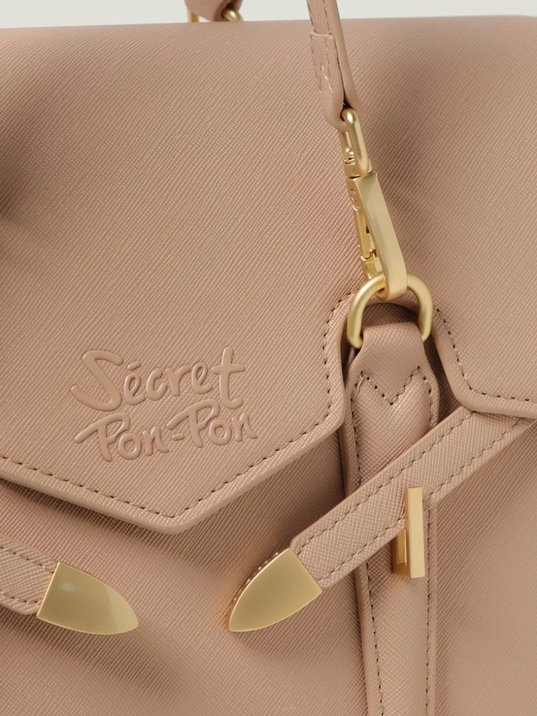 Borsa Yalis Grain Medium Secret Pon-Pon in pelle sintetica saffiano