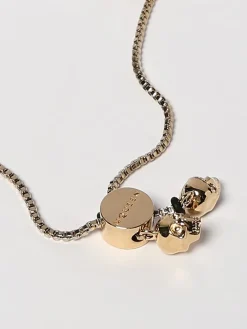 Bracciale McQueen in ottone con perle sintetiche e strass incastonati