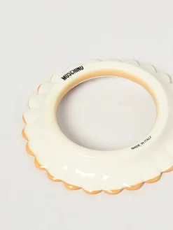 Bracciale Moschino Couture in ottone smaltato effetto porcellana