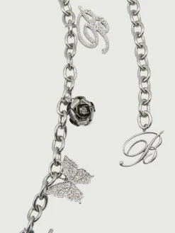 Cintura Blumarine in ottone con charms e strass incastonati