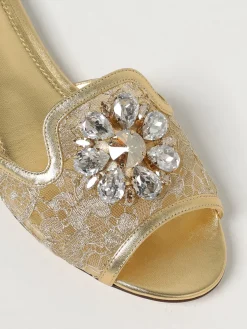 Mules Dolce & Gabbana in pizzo e pelle laminata con fibbia gioiello