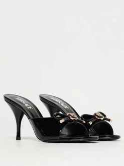 Mules Medusa Versace in vernice con fiocco