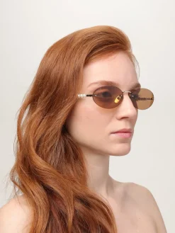 Occhiali da sole GG1922S Gucci in metallo con perle applicate