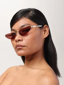 Occhiali da sole in metallo Gucci con perle