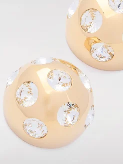 Orecchini Jacquemus in ottone con strass incastonati