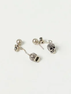 Orecchini McQueen in ottone con pavè di strass