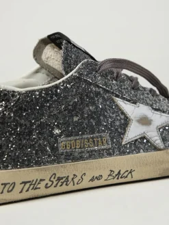Sneakers Super-Star Golden Goose in pelle laminata e glitter used
