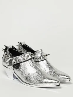 Stivaletto Junya Watanabe in pelle laminata con borchie